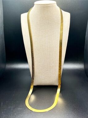 Long Flat Herringbone-Style Gold Chain Necklace. 1980s vintage marked DM